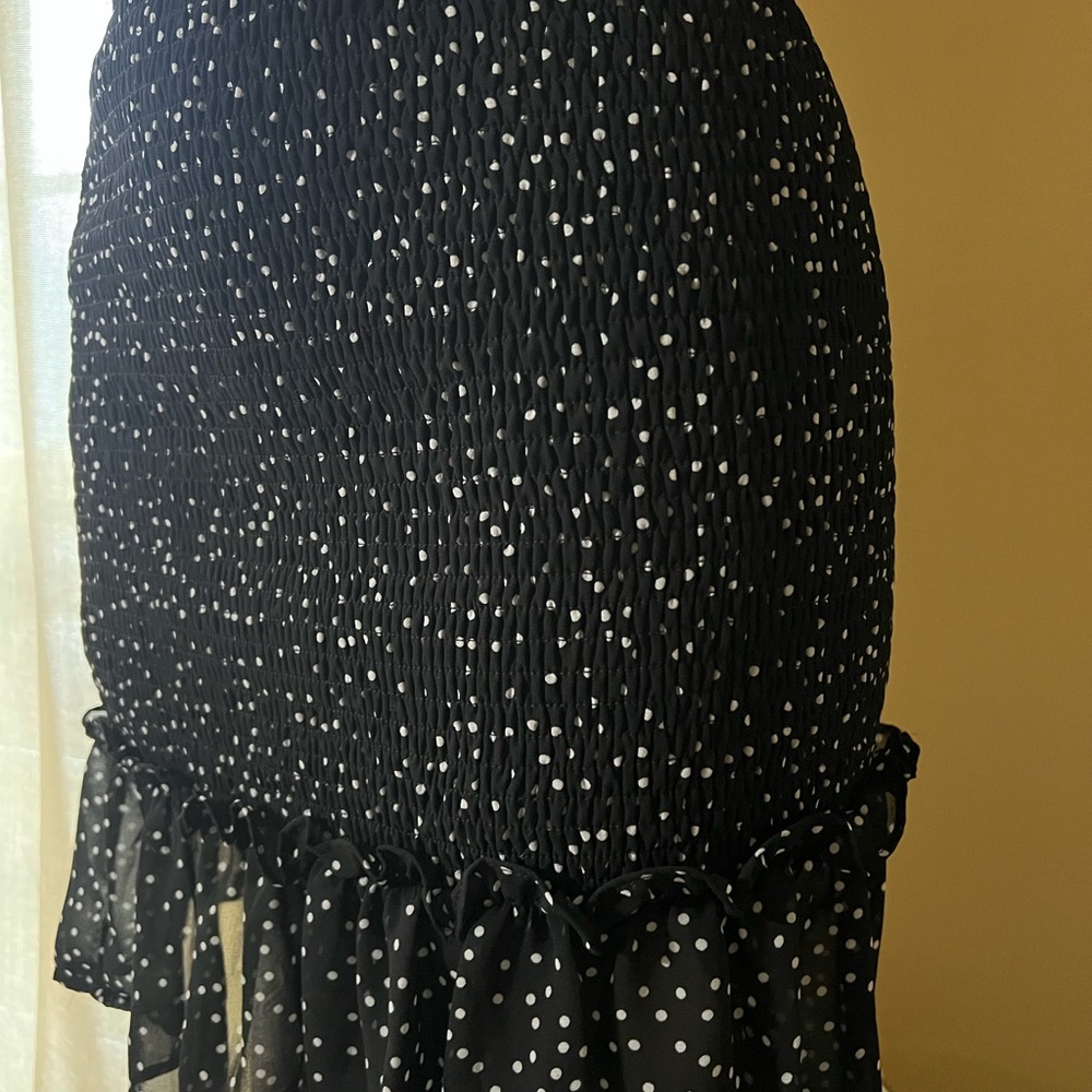 Juliana’s Elegant Black and White Polka Dot Midi Skirt